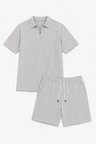 Ensemble d'été deux pièces gris pour homme avec chemise à demi-fermeture éclair et short