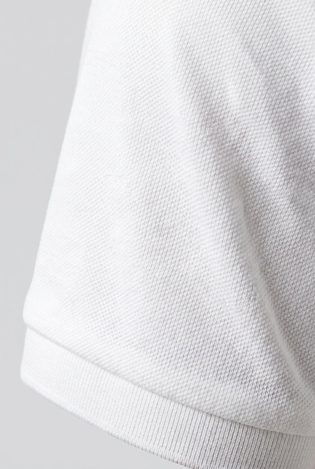 Polo hombre blanco, corte slim, de tejido técnico, transpirable, para verano